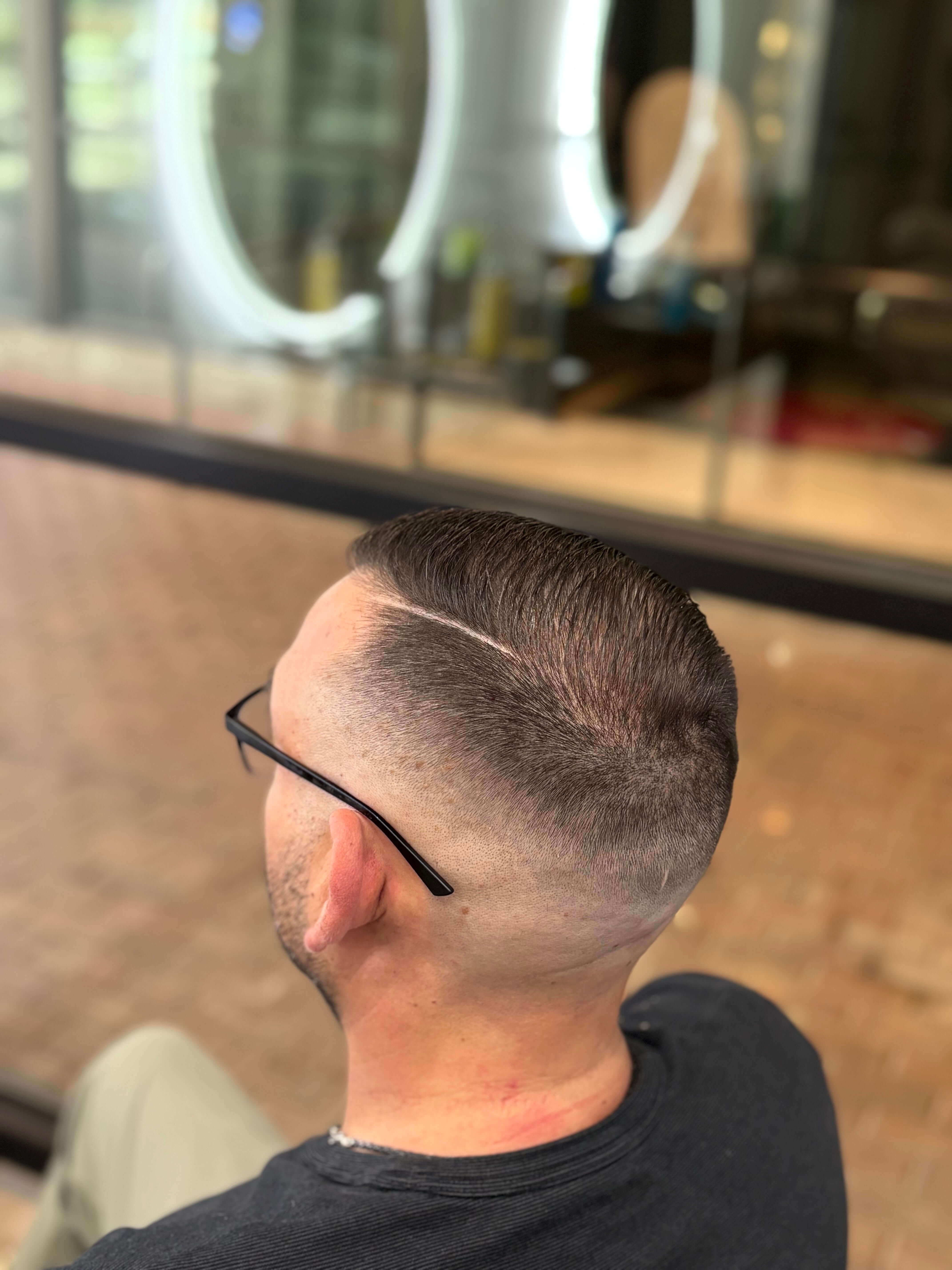High Fade Buzz Cut with Hard Part at Ritual Barber Studio